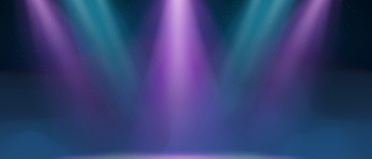 Stock image of blue and purple lights on a stage