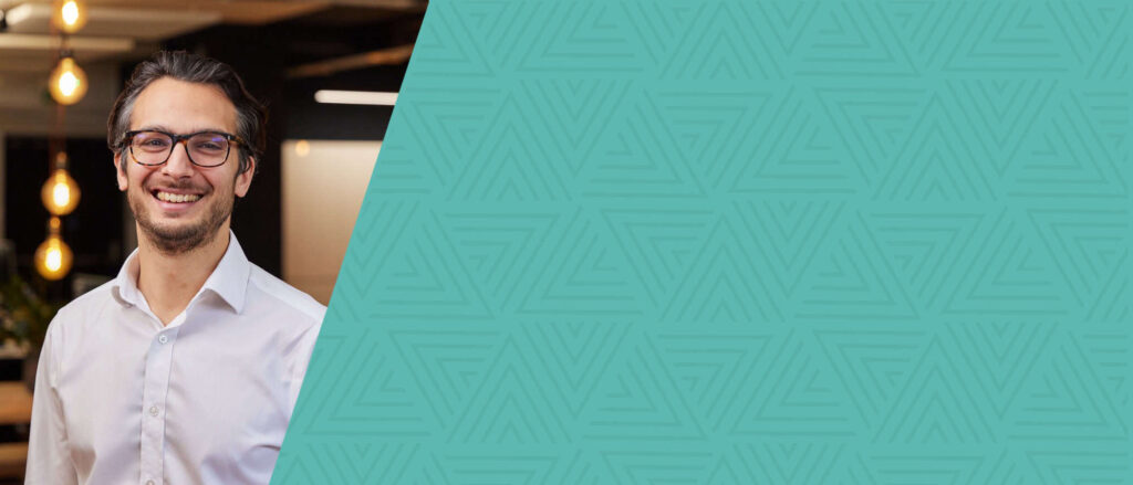 Conrad's Headshot with Teal Background