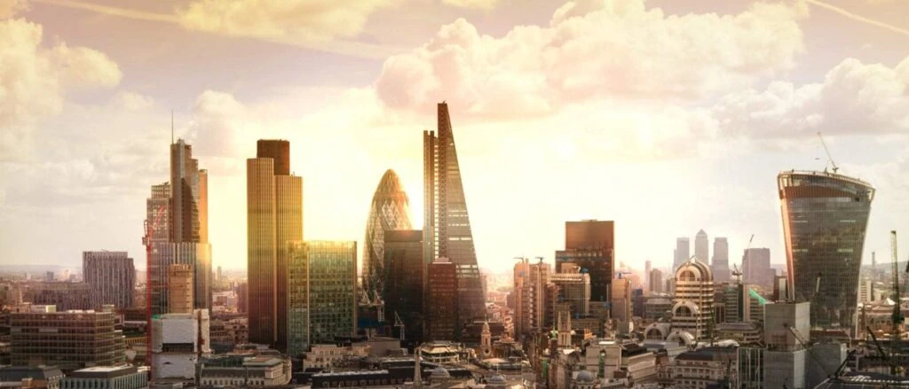 London city skyline with iconic buildings at sunset, vibrant and modern urban landscape.